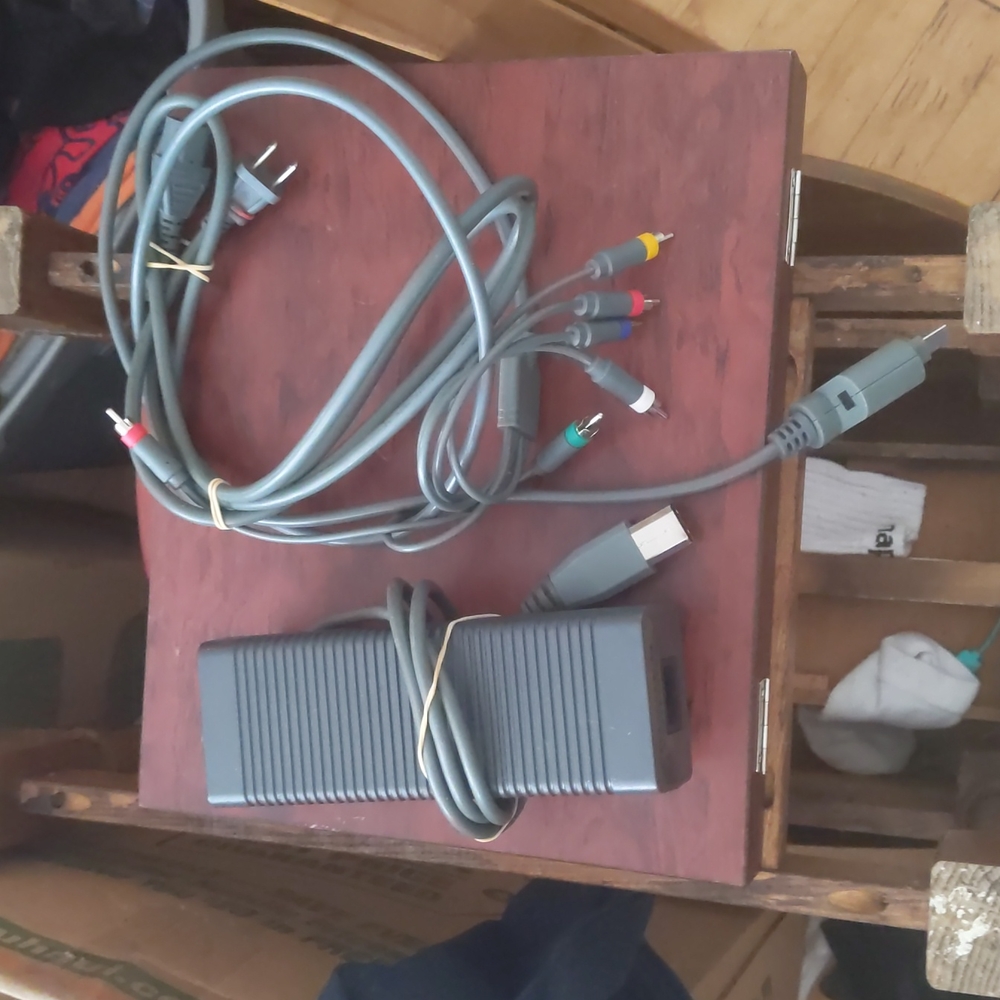 A external hard drive for an Xbox 360, and the cable connect cords.